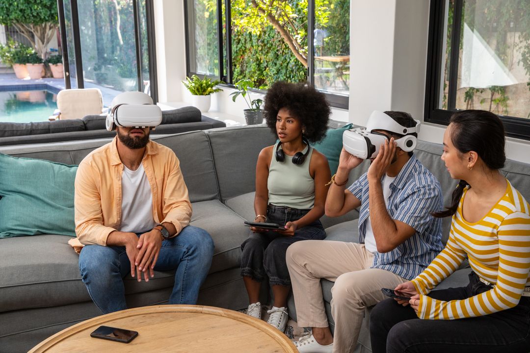 Friends Experimenting Together with VR Headsets in Relaxed Home Environment