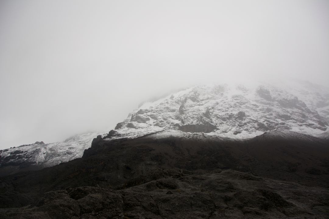 Mountain Alps Under Foggy Skies - Free Images, Stock Photos and Pictures on Pikwizard.com