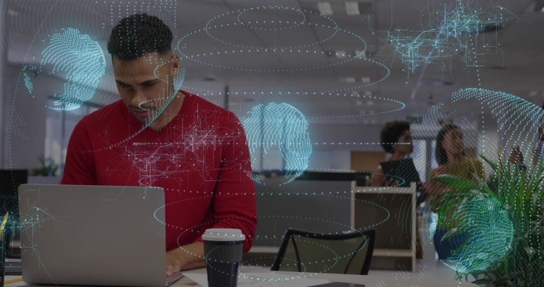 Innovative Professional Working on Laptop in Futuristic Office with Holographic Graphics