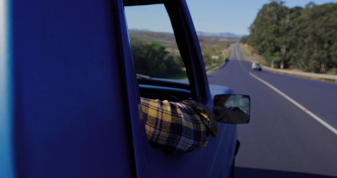 Scenic Open Road View from Vehicle Window