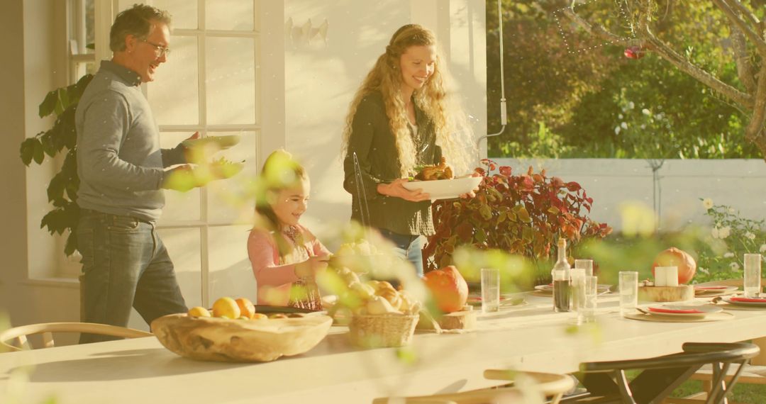 Family Gathering Around Sunlit Rustic Backyard Table Serving Bread and Smiles
