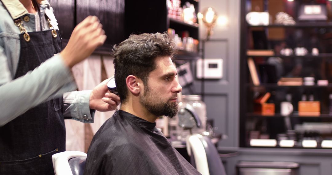 Man at Barbershop Getting Haircut by Professional Hairdresser - Free Images, Stock Photos and Pictures on Pikwizard.com