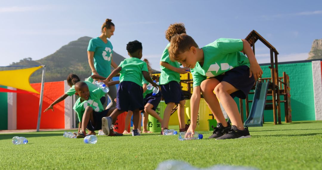 Children Collecting Plastic Bottles for Recycling Outdoors