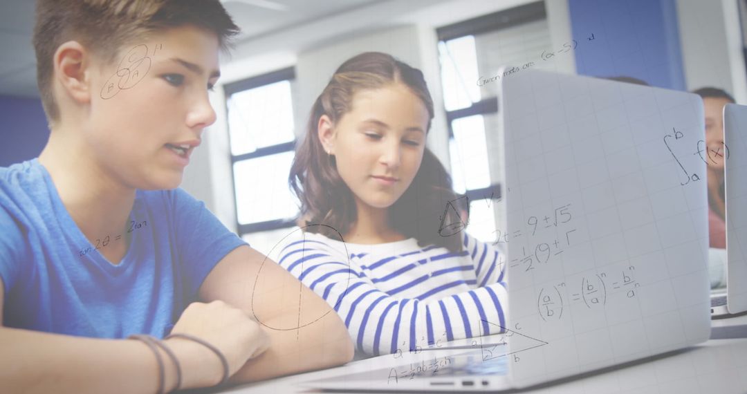 Students Collaborating on Laptops with Mathematical Concepts