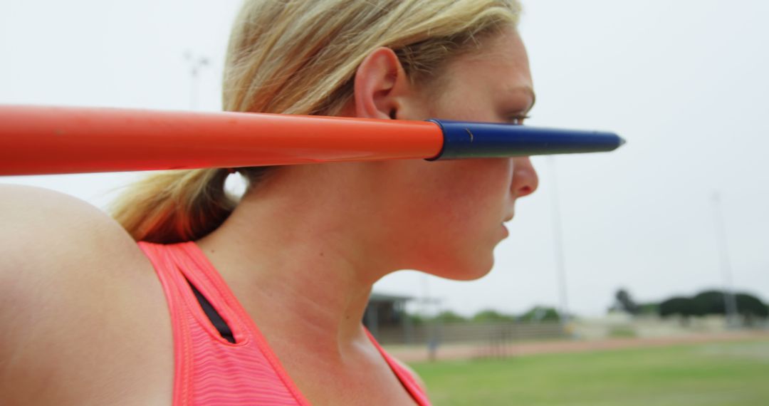 Athlete Preparing to Throw Javelin in Track and Field Event - Free Images, Stock Photos and Pictures on Pikwizard.com