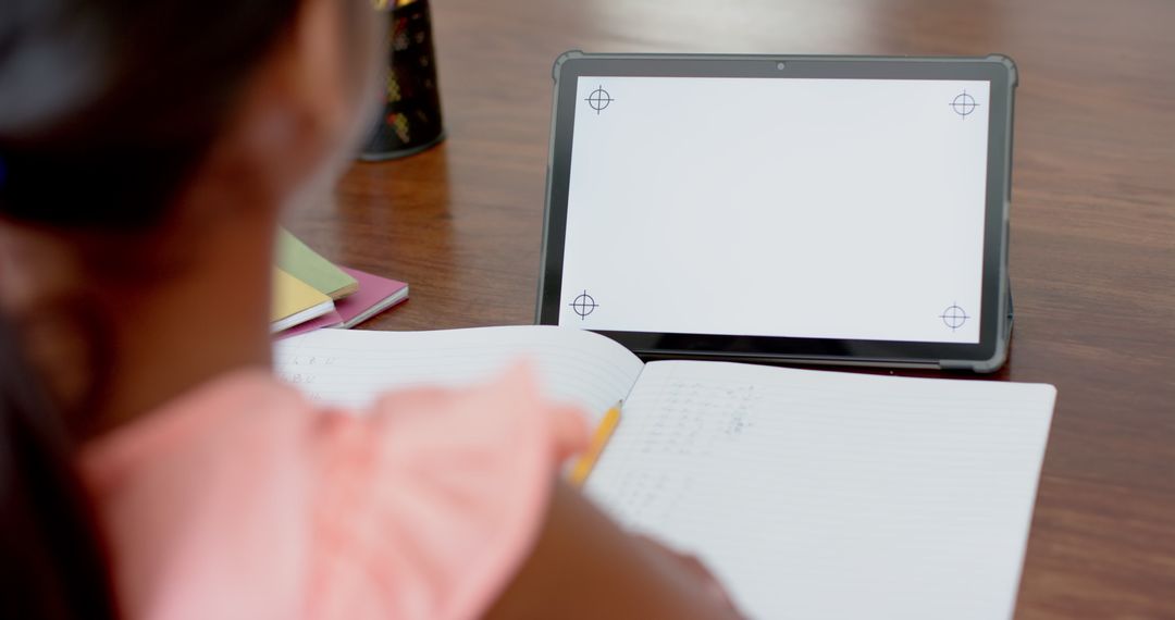 Girl Studying with Tablet at Home for Online Elementary School Lesson