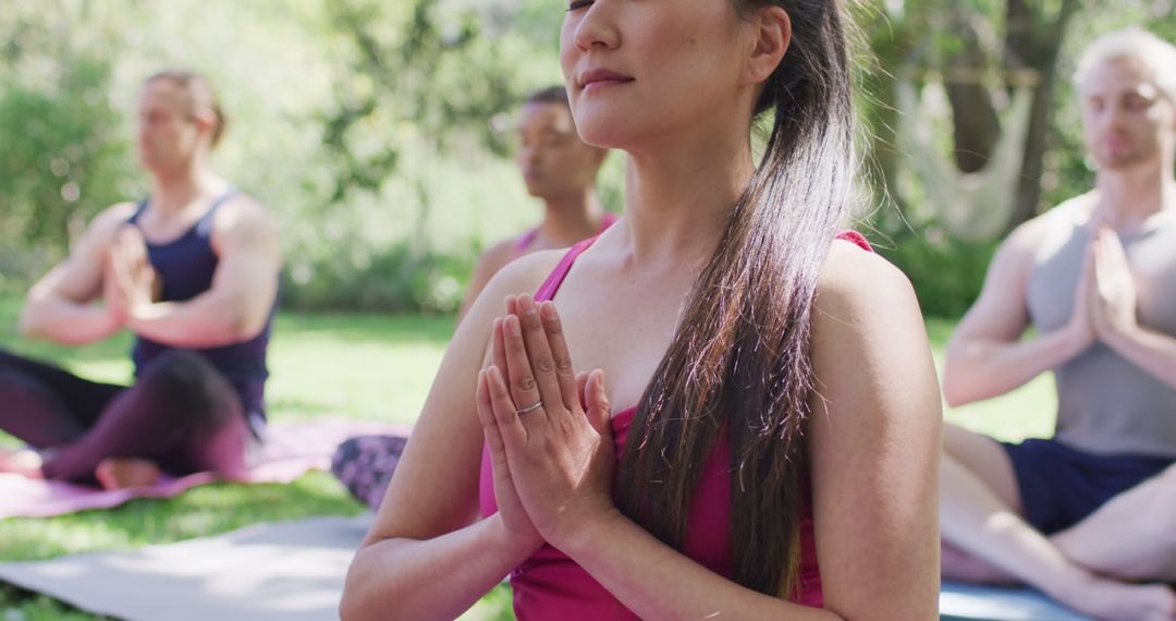 Diverse Group of People Meditating in Park Doing Yoga - Free Images, Stock Photos and Pictures on Pikwizard.com