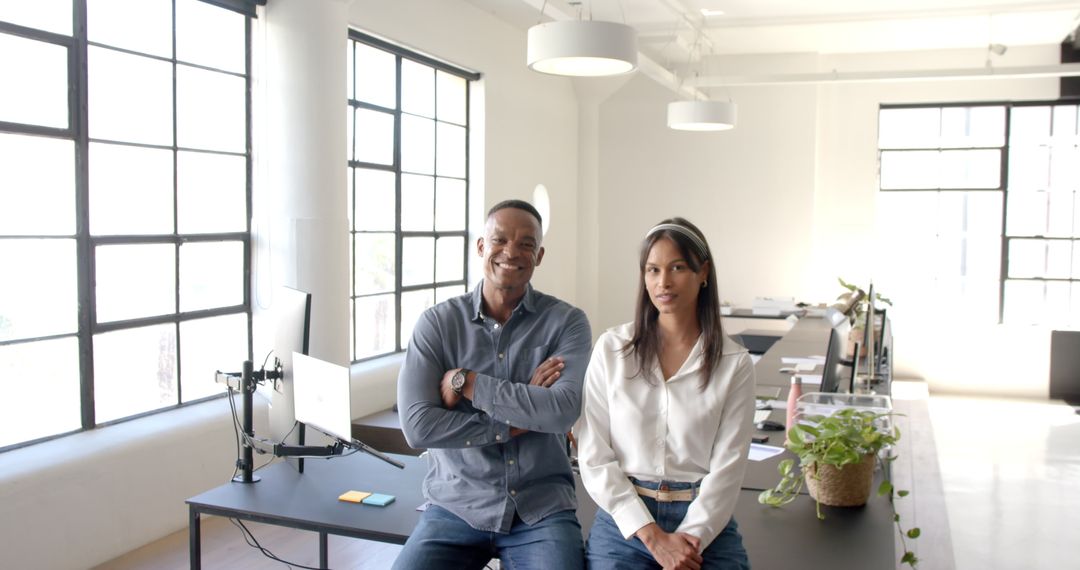 Business Professionals Discussing in Modern Office Workspace