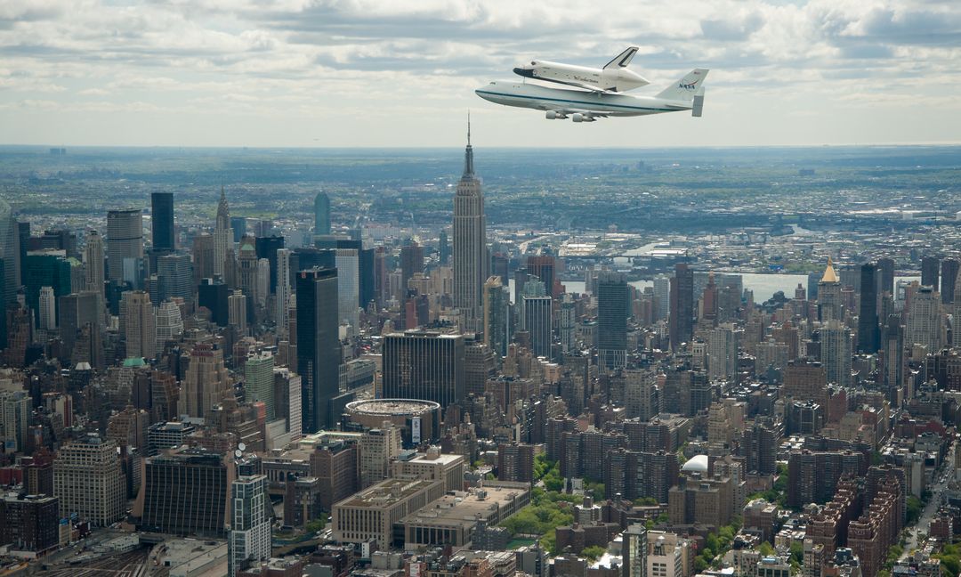 Space Shuttle Enterprise Flying Over New York City, April 27, 2012 - Free Images, Stock Photos and Pictures on Pikwizard.com