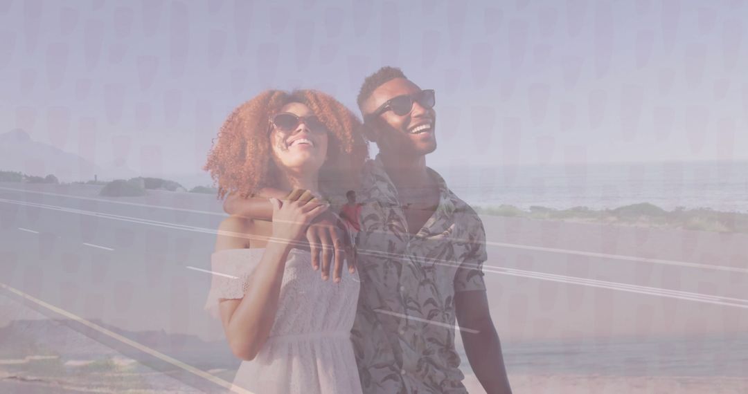 Smiling Couple on Coastal Road with Scenic Ocean View