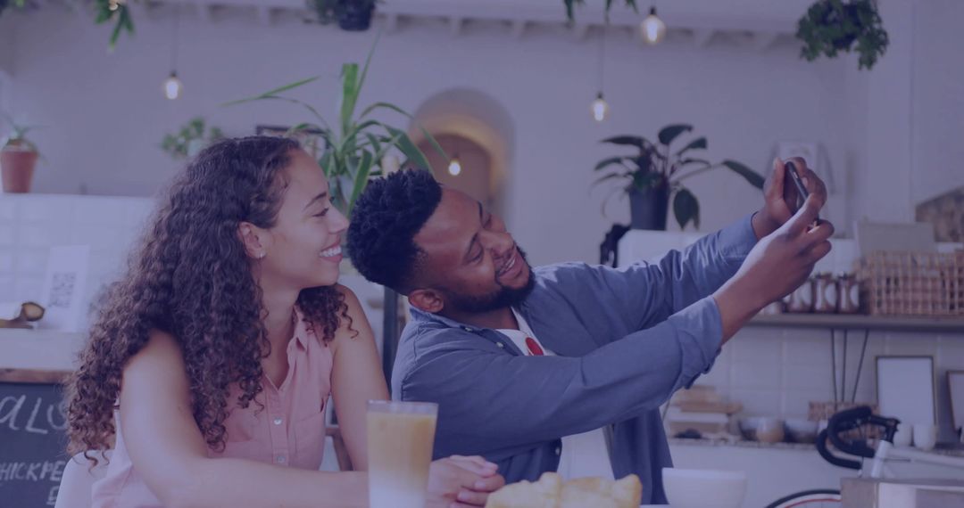 Smiling Couple Sharing Relaxed Moments in Cozy Café Setting