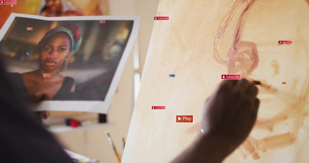 Artist Painting Portrait in Studio with Printed Reference