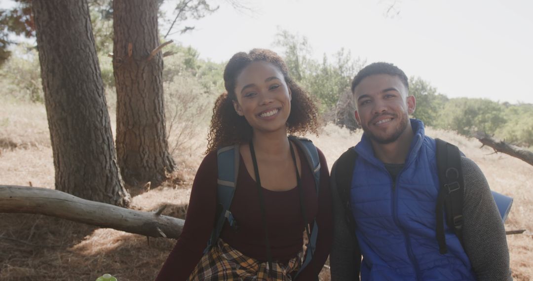 Joyful Couple Exploring Nature on Forest Hike