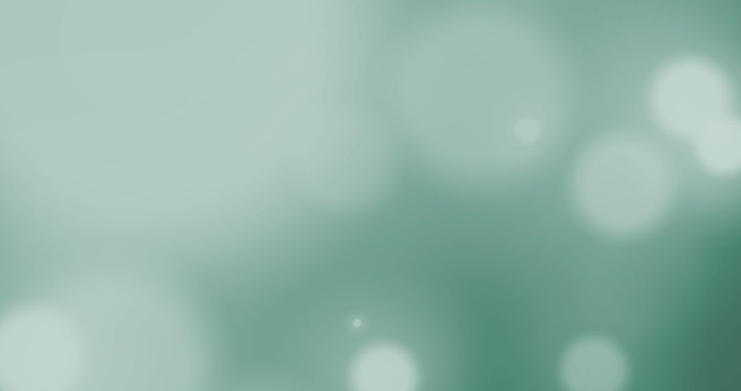 Soft Focus Light Spots on Green Gradient Background