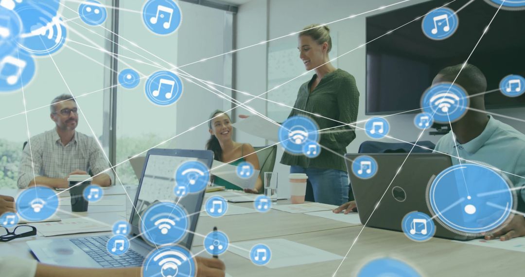 Diverse Team Innovating in Modern Networked Office Environment