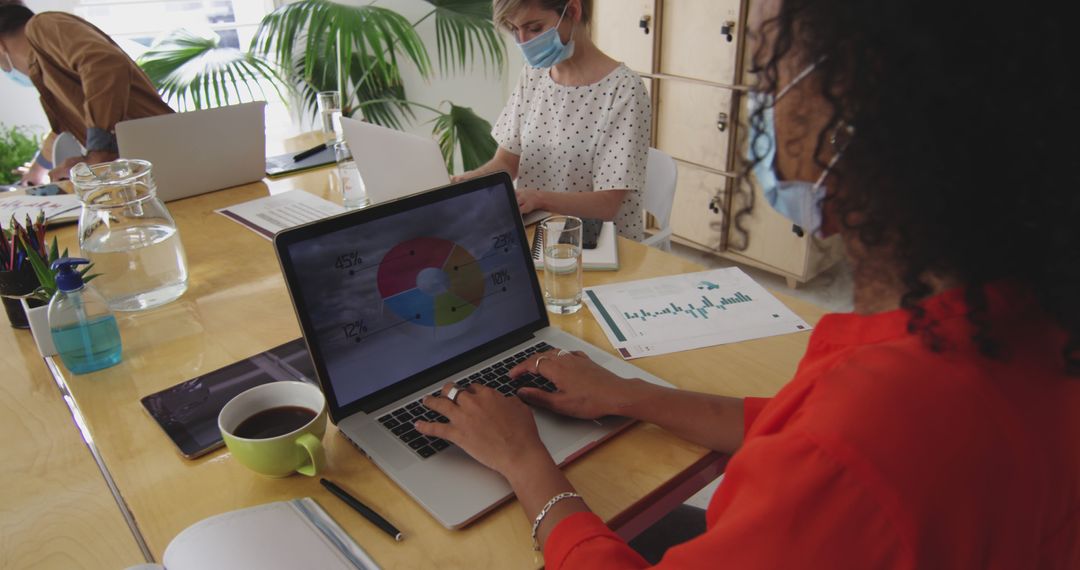 Diverse Team Collaborating Safely in Office