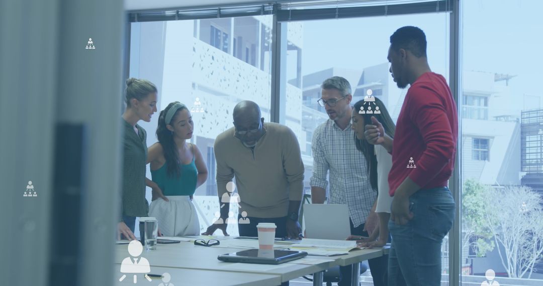 Diverse Coworkers Analyzing Floor Plan and Maps with Digital Strategy Icons