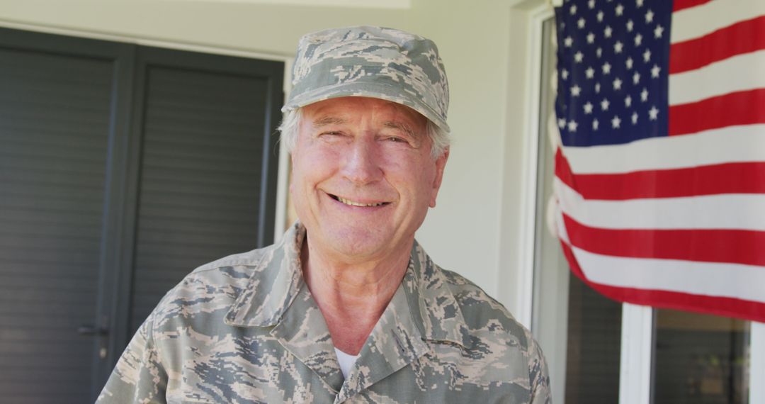 Image of happy caucasian senior soldier wearing uniform standing outside house - Free Images, Stock Photos and Pictures on Pikwizard.com