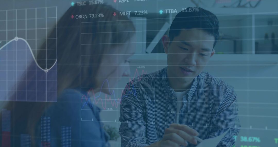 Business Professionals Analyzing Financial Report with Data Overlay