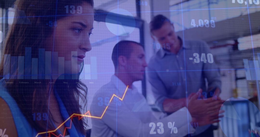 Business Professionals Analyzing Data with Graphs in Office