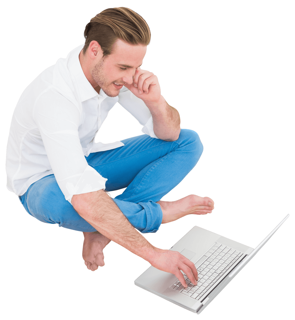 Man Sitting Cross-Legged Using Laptop on Transparent Background