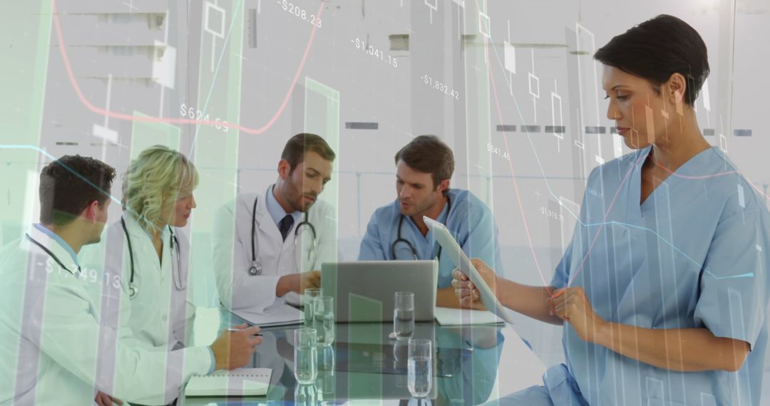 Healthcare Professionals Analyzing Data in Hospital Meeting