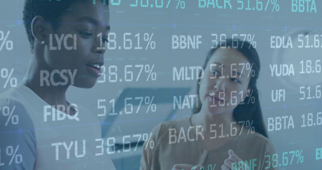Diverse Businesswomen Collaborating with Trading Data Overlay