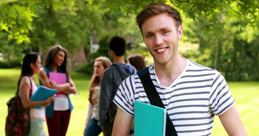 Smiling Caucasian Student Outdoors on University Campus