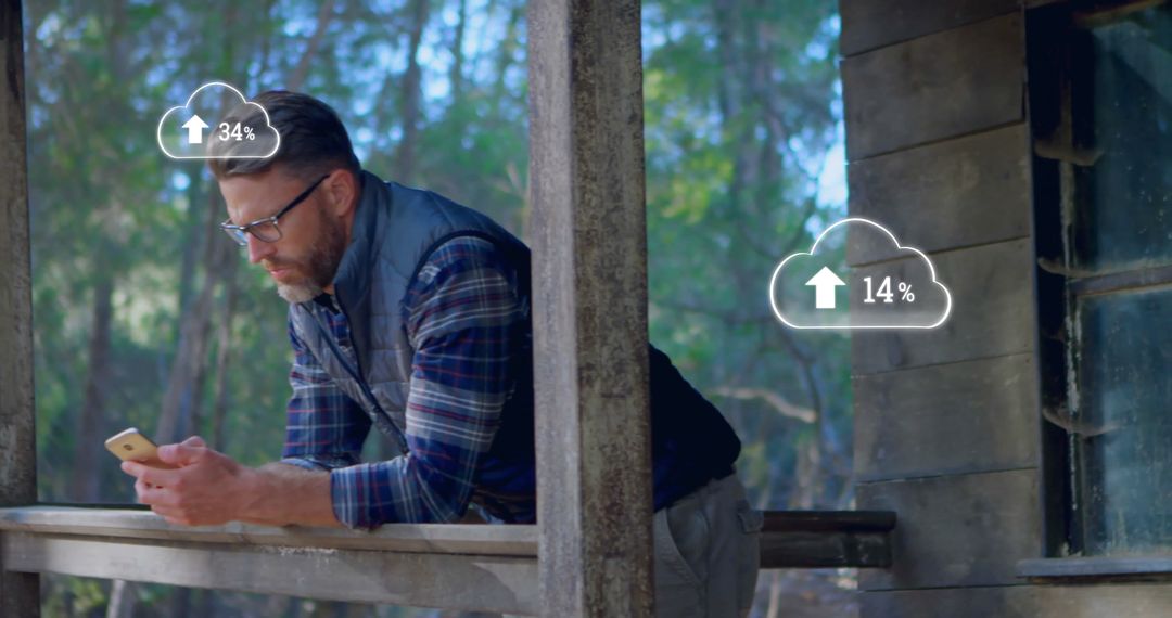 Man Tracking Data Usage on Smartphone Outdoors