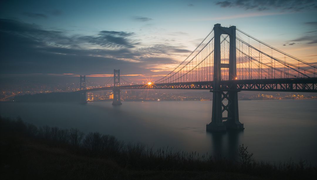Serene Twilight Over Majestic Suspension Bridge with Cityscape