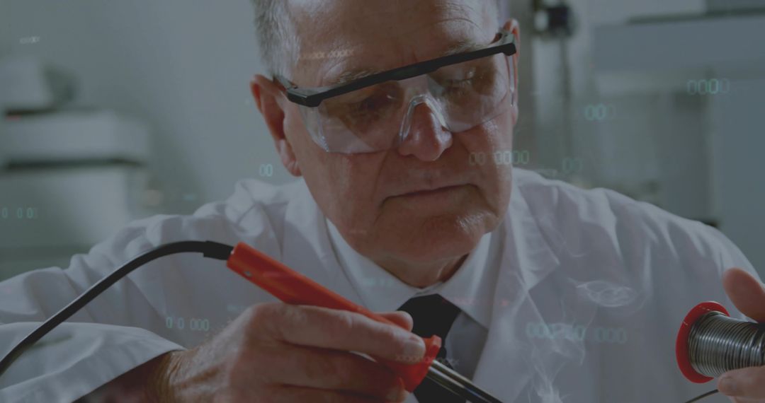 Elderly Technician Expertly Using Soldering Iron in Laboratory