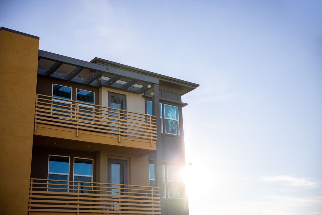 Modern Apartment Building with Sunlit Balconies