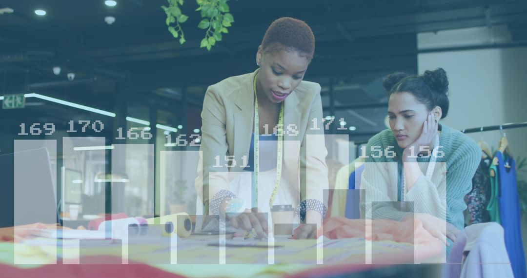 Diverse Team Analyzing Design with Digital Data Overlay in Office