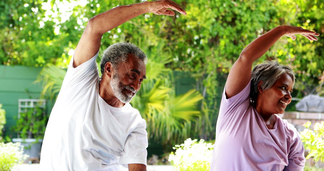 Senior African American Couple Practicing Yoga Outdoors with Smiling Faces - Free Images, Stock Photos and Pictures on Pikwizard.com