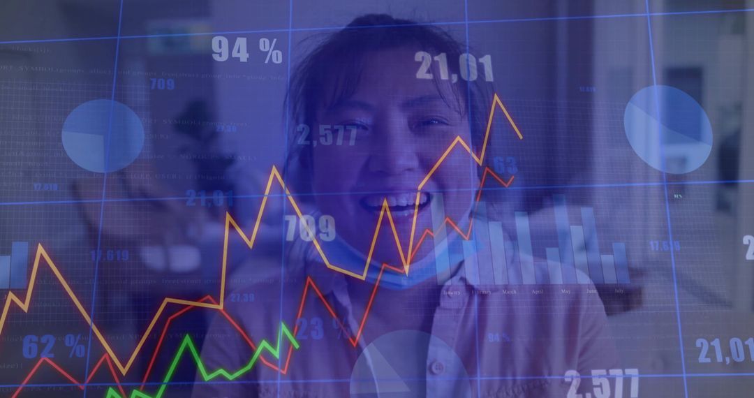 Asian Businessman Analyzing Financial Data with Overlay Charts