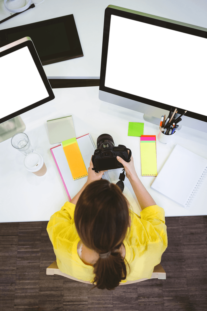 Transparent Office Overhead View of Female Photographer at Work Desk