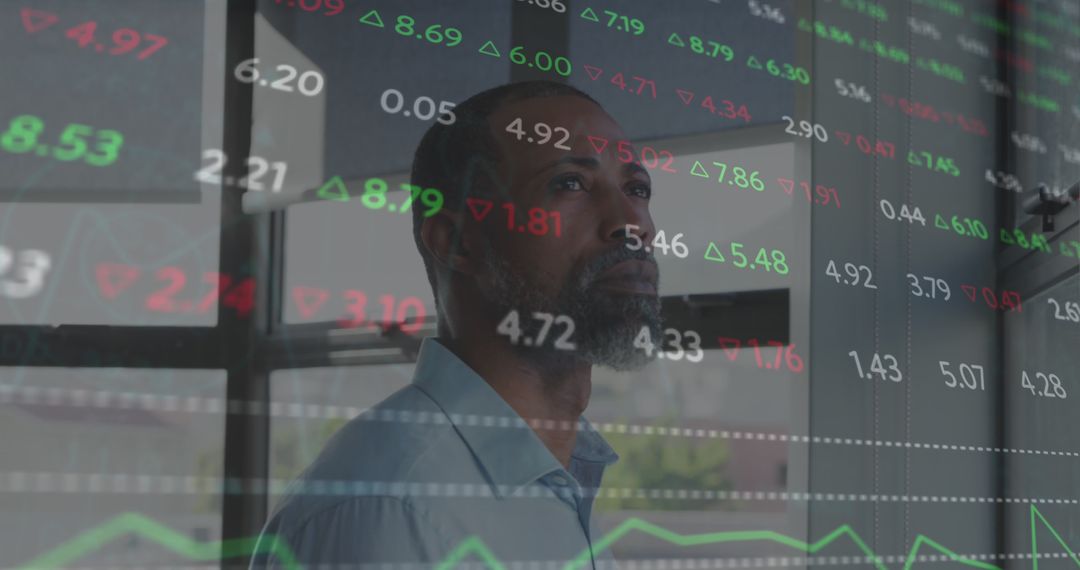 Man Analyzing Stock Market Data on Transparent Screen - Free Images, Stock Photos and Pictures on Pikwizard.com