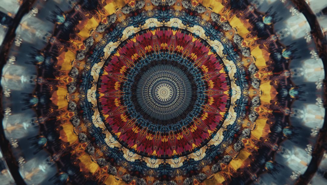 Vibrant Mandala Kaleidoscope in Red, Yellow, and Blue