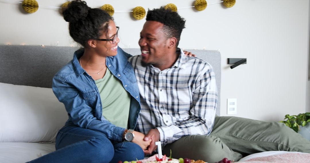 Cheerful Couple Celebrating Anniversary at Home