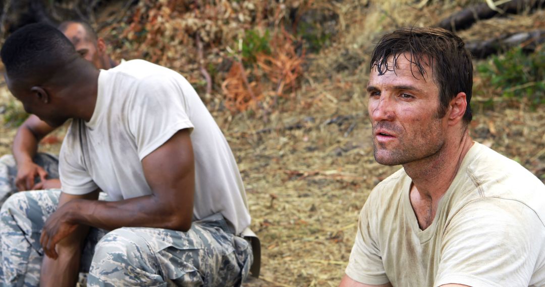 Exhausted Men Resting After Intense Outdoor Workout