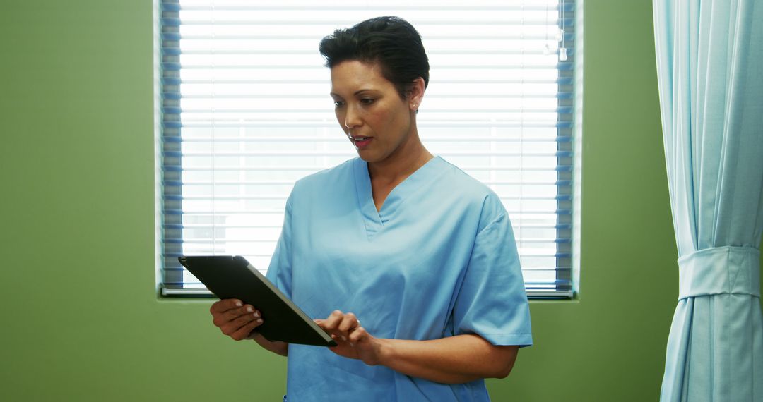 Nurse using digital tablet in hospital - Free Images, Stock Photos and Pictures on Pikwizard.com