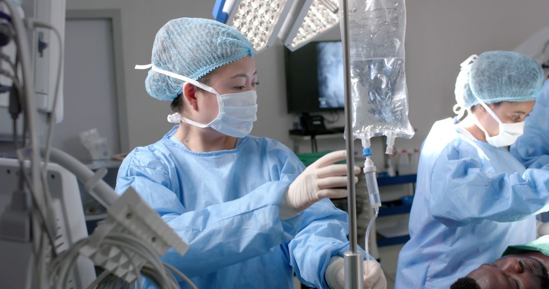 Doctors in Surgical Room Performing Procedure - Free Images, Stock Photos and Pictures on Pikwizard.com