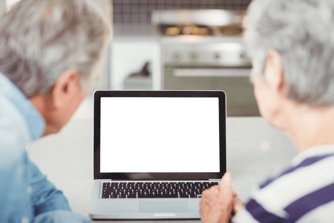 Senior Couple at Home Using Laptop with Transparent Screen