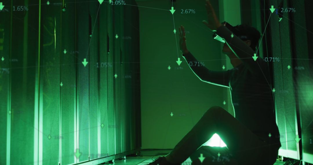 IT Engineer with VR Headset Monitoring Data in Server Room