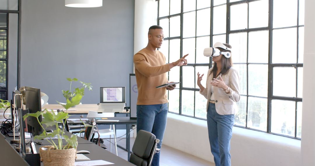 Colleagues Collaborating with Virtual Reality in Modern Office