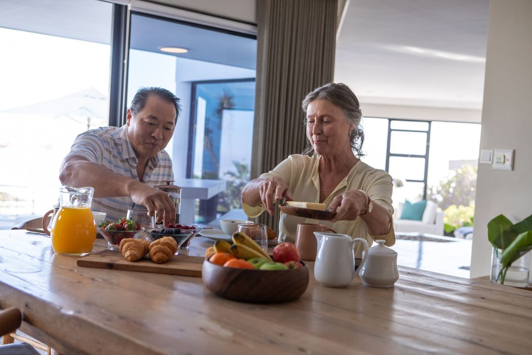 Senior Couple Enjoying Elegant Breakfast at Home