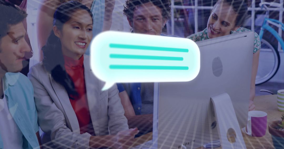 Diverse Team Collaborating on Desktop Project in Modern Office