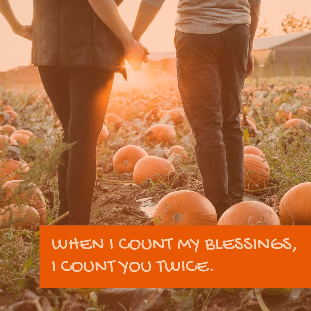 Romantic Couple Holding Hands in Pumpkin Patch at Sunset