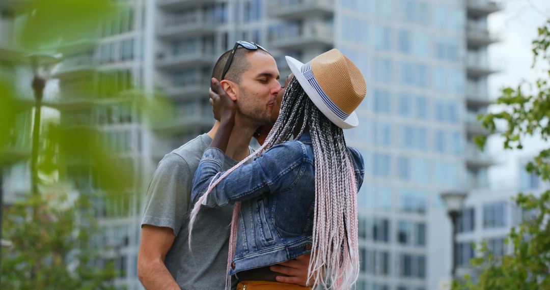 Romantic Multiracial Couple Kissing in Urban Park - Free Images, Stock Photos and Pictures on Pikwizard.com