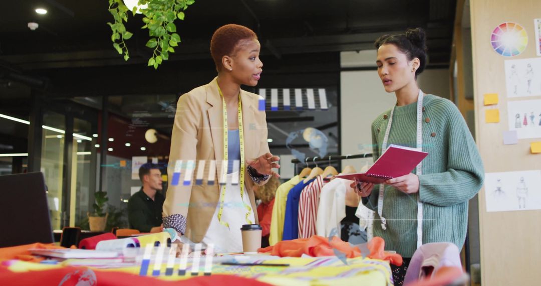 Two Fashion Designers Collaborating in Creative Office Space